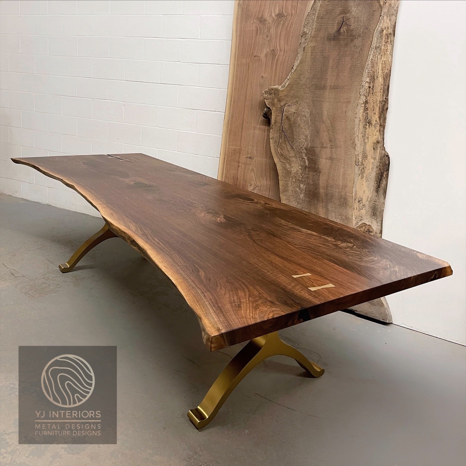 bronze wishbone live edge dining table
