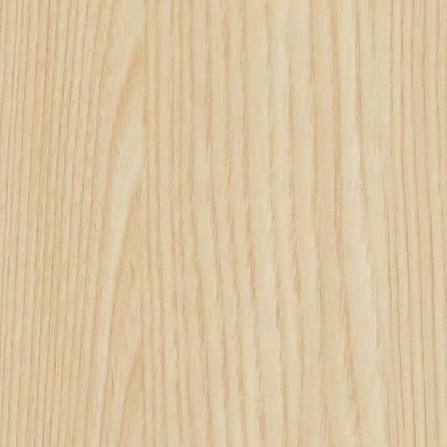 Close-up of a wooden surface with a light brown color and visible grain pattern.