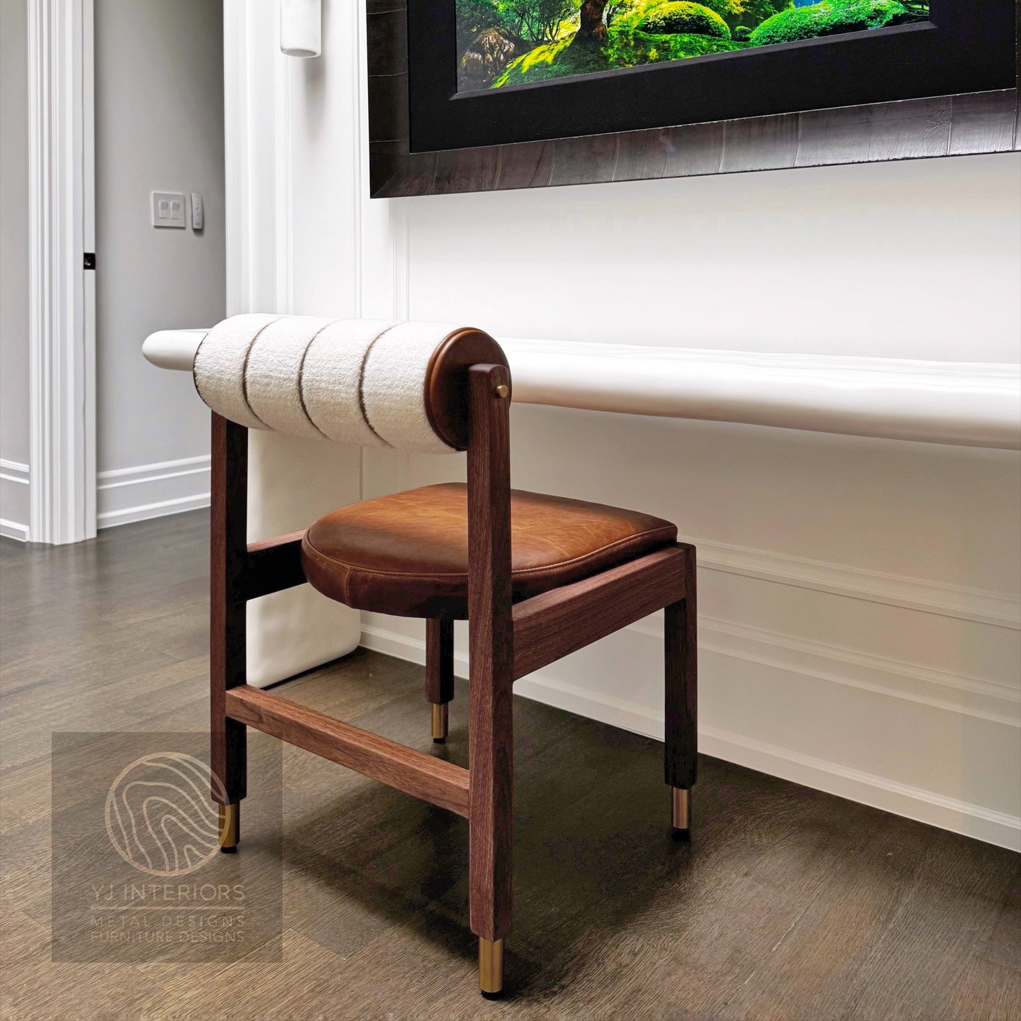 Wooden chair with a brown leather seat and white sheepskin bolster backrest 