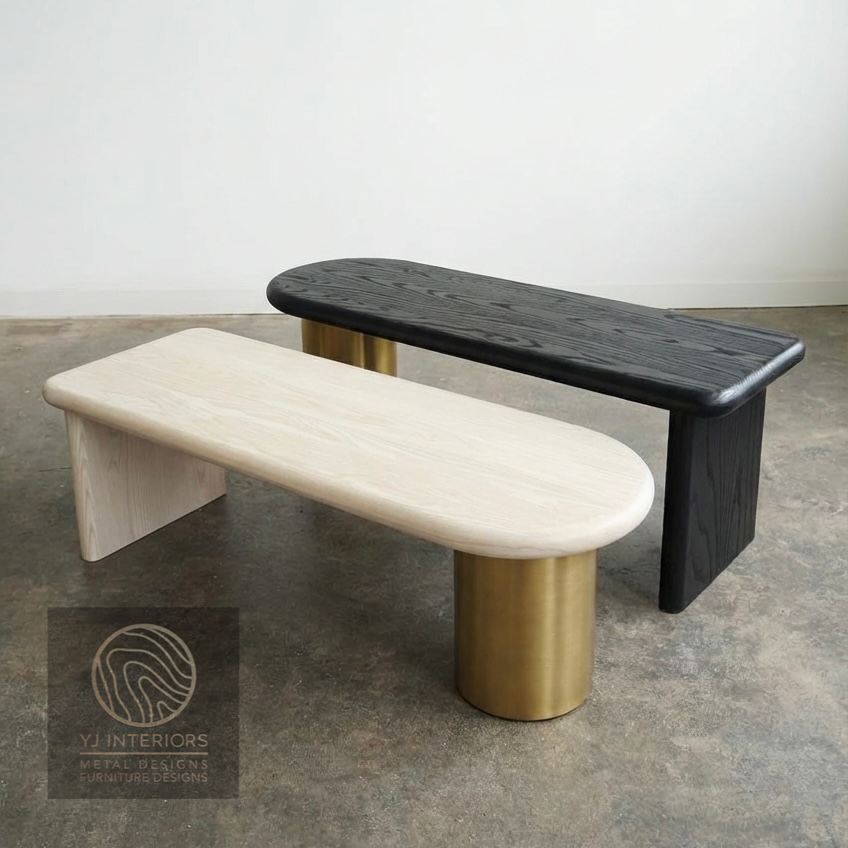 Two modern benches, one beige and one black, on a concrete floor with a neutral background.