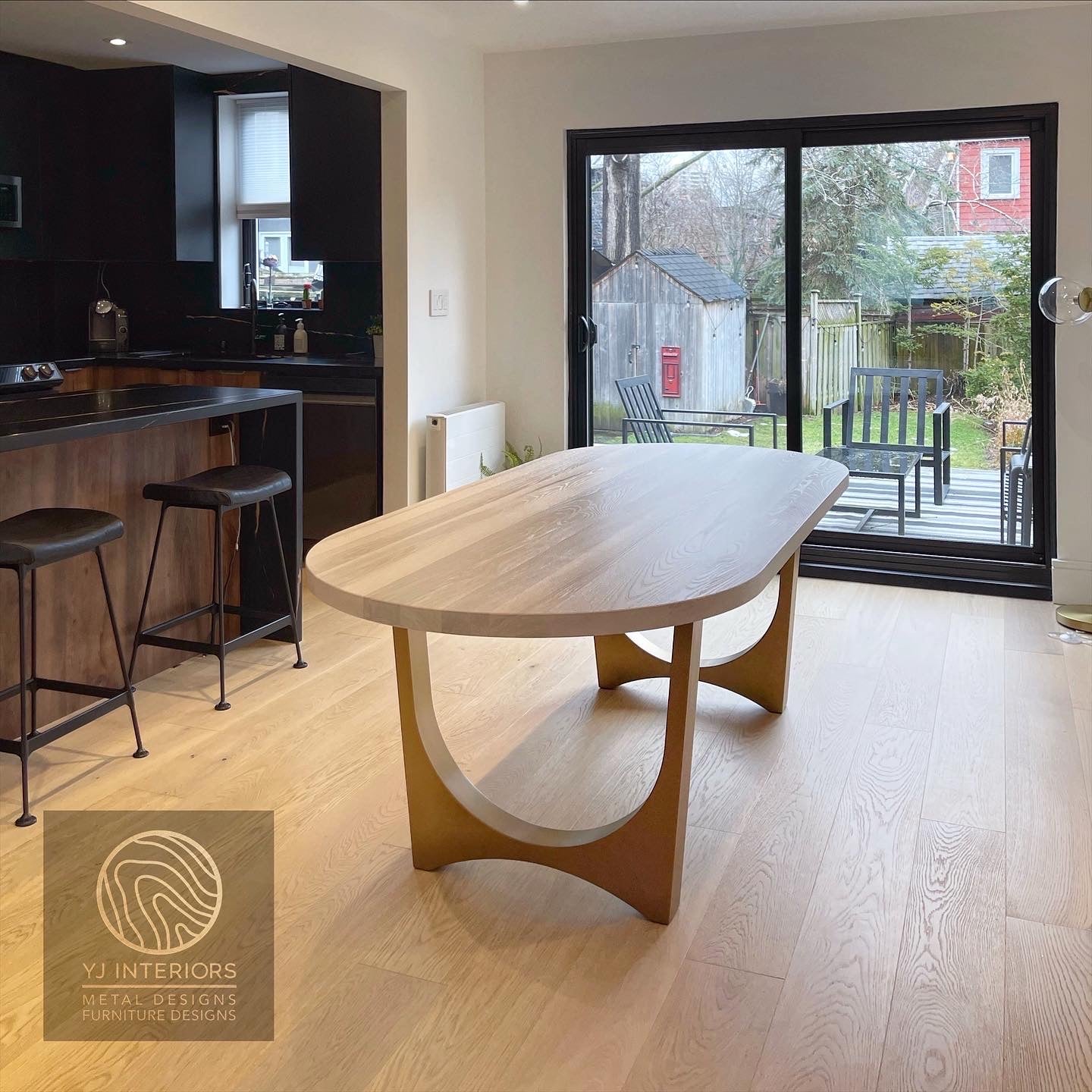 bleached oak oval brass table
